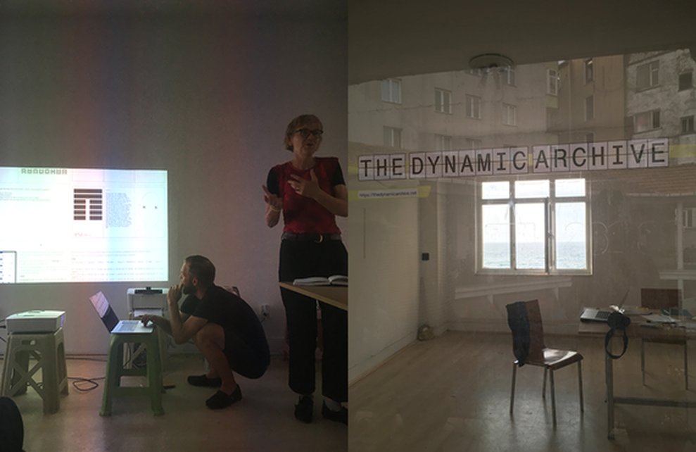 Presentation as part of The Dynamic Archive, person in front of a projection in a seminar room.